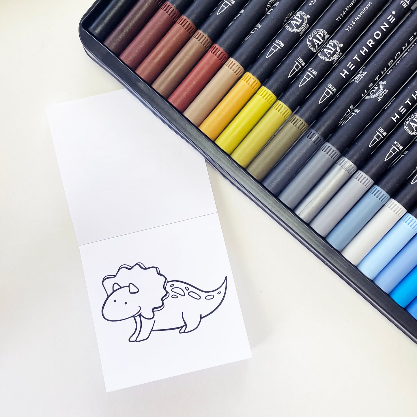 Dinos, Dragons, Diggers, and Dogs Mini Coloring Book